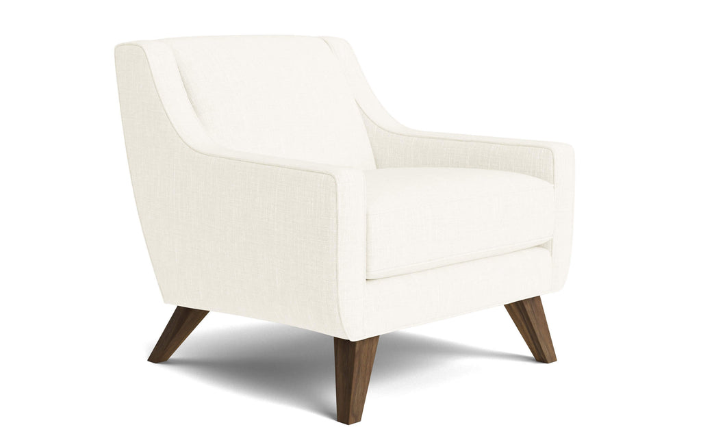 Chaise en latex naturel – La chaise prend une allure élégante avec ses passepoils soignés, ses lignes inspirées du milieu du siècle et son dossier haut et incliné.