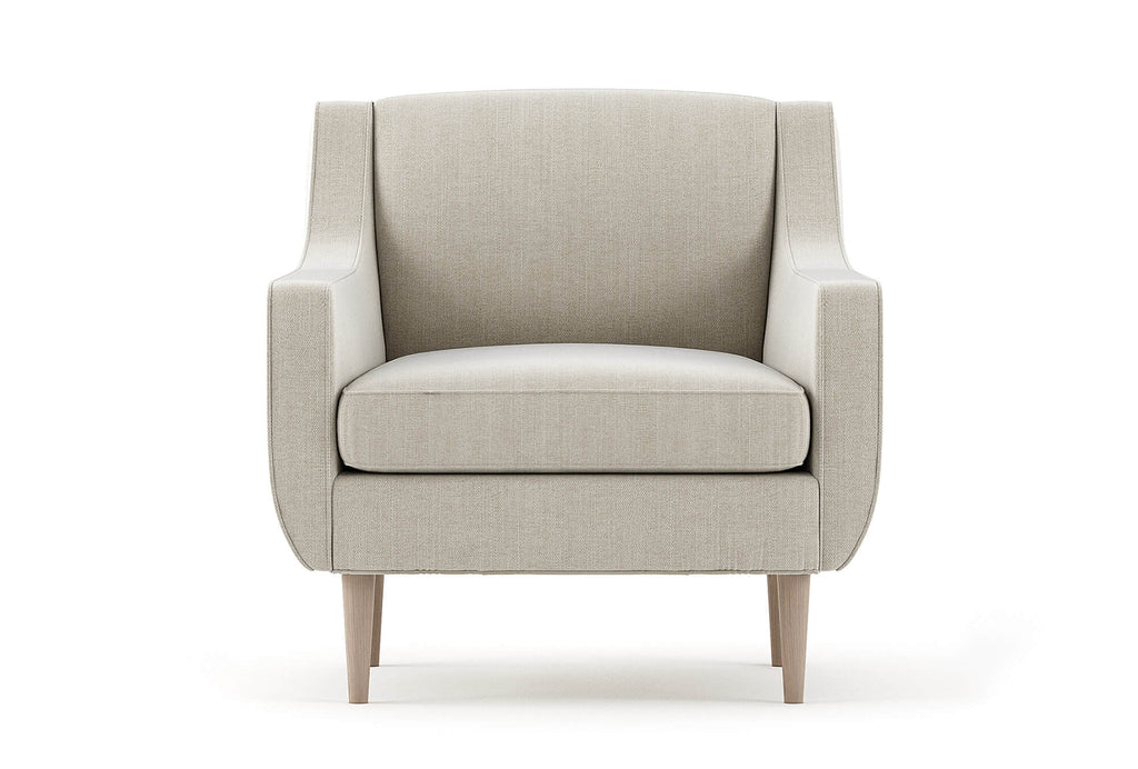 Chaise en latex naturel – La chaise prend une allure élégante avec ses passepoils soignés, ses lignes inspirées du milieu du siècle et son dossier haut et incliné.